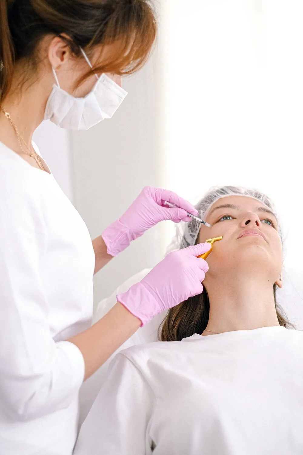 Facial aesthetic evaluation in the office — illustrative of the area between the brows