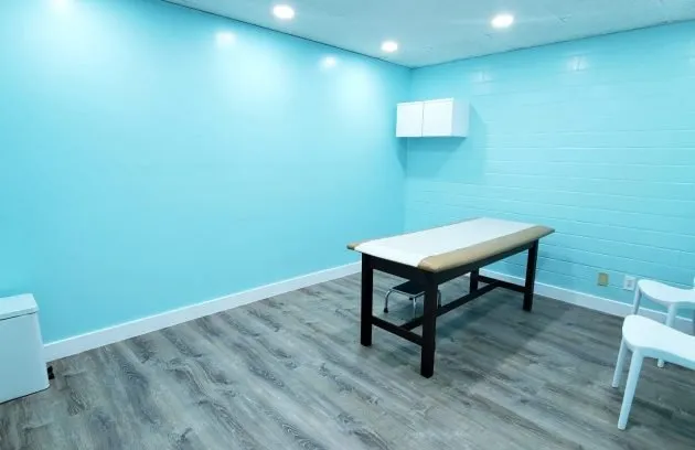 Exam room with an examination table